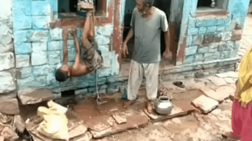 Intoxicated father hangs his son upside down and brutally beats him